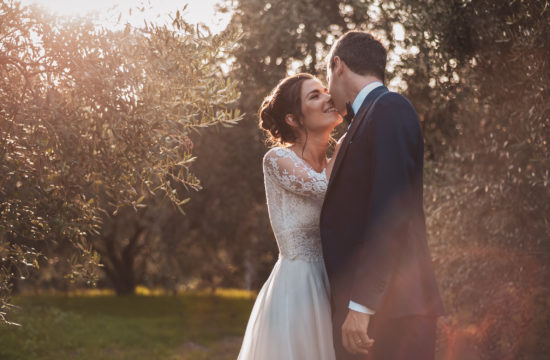 wedding-kiss-wood-olive-tree-villa-da-prato-caldiero-verona
